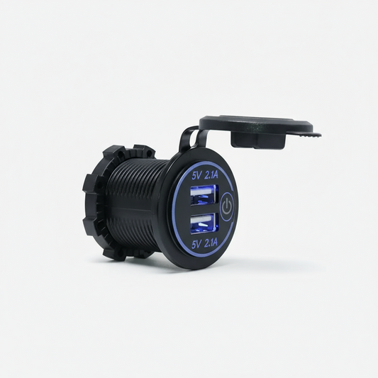 Black car charger with dual USB ports and power indicator on a white background