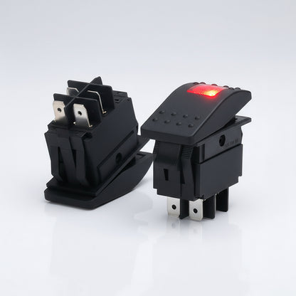 Two black rocker switches on a white background